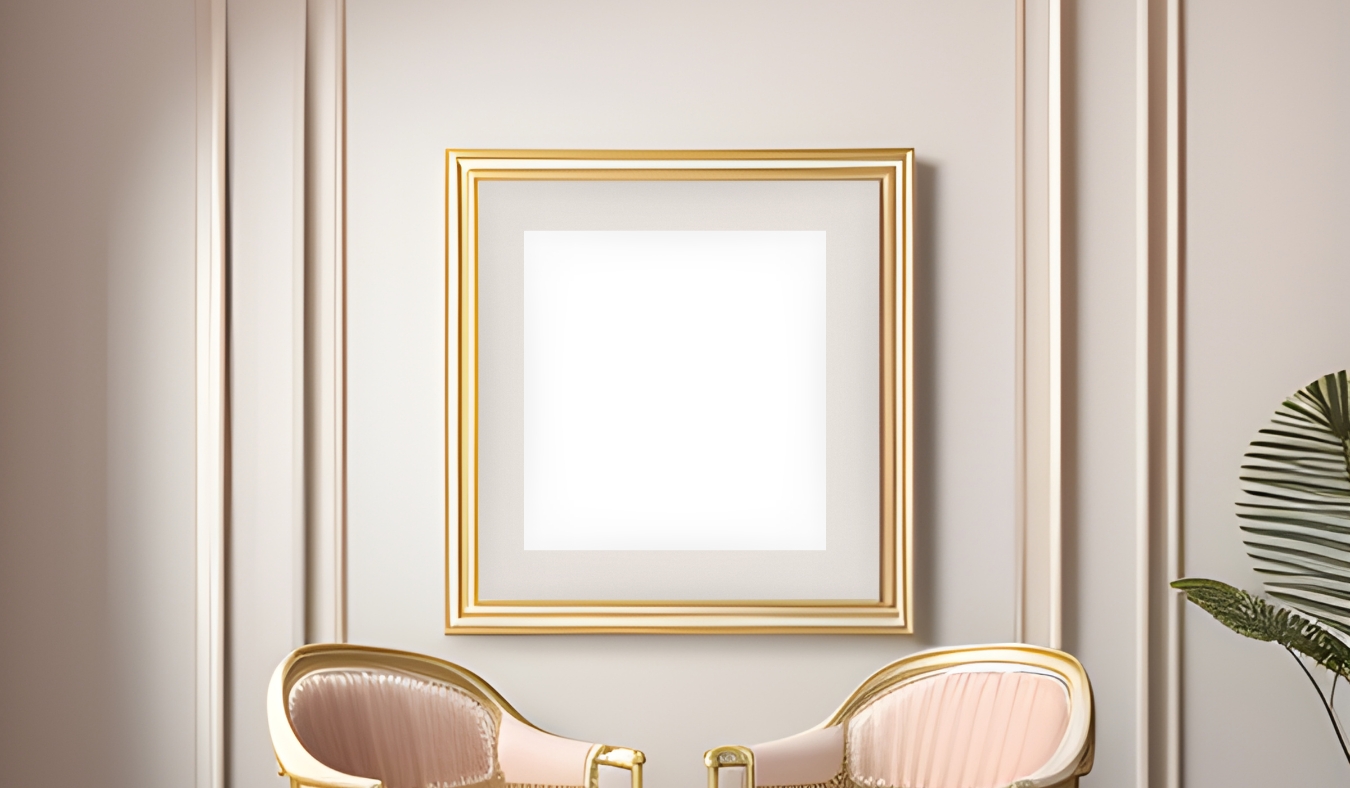 A gold frame hung on a wall in a living space between two chairs.